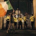 Even as the two Brians were speaking, demonstrators were already arriving at government buildings to protest. A Sinn Féin protestor was taken to hospital after being reportedly struck by a car. Julien Behal/PA Wire