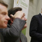 Dan Boyle wipes his forehead as John Gormley tells the public that his party will withdraw from government in two months. Julien Behal/PA Wire