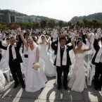 Attention all getting a bit much? Kate and William could consider dodging the cameras in a mass wedding like this one in South Korea.
