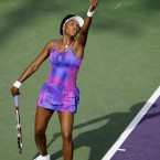 Venus serves to Shahar Peer of Israel during day six of the Sony Ericsson Open at the Crandon Park Tennis Center in 2009.