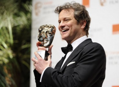 Colin Firth poses with the award for Best Actor