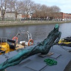 The Anna Livia statue takes a trip on the Liffey from which she takes her name to take up a new resting place in the Croppy Acre on Dublin's north quays. Pic courtesy of Dublin City Council.