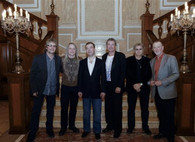 A very happy Russian President, Dmitry Medvedev, poses with members of the British rock band Deep Purple.