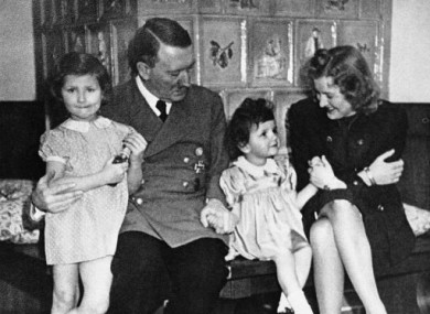An intimate family picture of German Chancellor Adolf Hitler, Eva Braun and two little girls, shown Nov. 17, 1945.  There have been various reports that the couple had at least one child. 