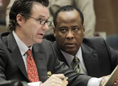 Dr Conrad Murray, left, appeared in court in LA on 25 January, 2011.