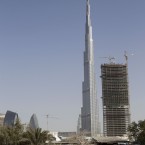 The world's tallest tower has over 160 inhabitable floors - and Alain Robert is climbing it by hand in seven hours.