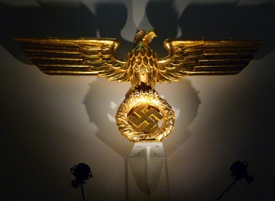 The band's uniforms featured Nazi insignia, such as the eagle