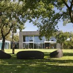 The home looks out onto an idyllic setting of grass and trees, just outside Warsaw in Poland<span class=