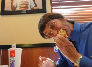 Don Gorske, 59, a retired prison guard, eats his 25,000th Big Mac. 