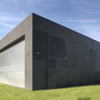 ...and hey presto! It's a featureless concrete fortress.<span class=