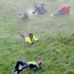 Ouch... Competitors take part in Cheese-Rolling on Coopers Hill, Gloucestershire today after the official event was cancelled. (Pic: Tim Ireland/PA Wire)
