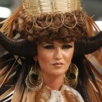 Model Ciara McStravick from Lisburn in an outfit entitled 'tribal' competes in the Fantasy section of the OMC European Hairdressing Championships 2011 at the RDS in Dublin today. (Niall Carson/PA Wire)