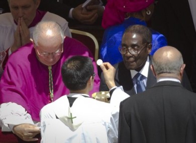 Robert Mugabe, right, at the beatification of Pope John Paul II