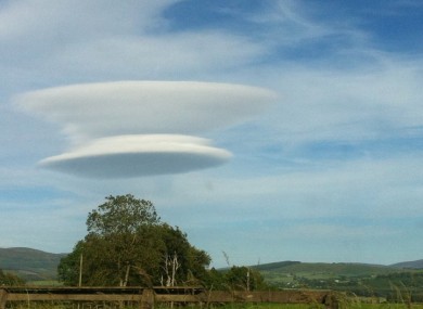 Not a flying saucer but a cloud. 