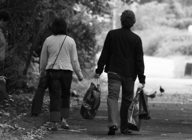 Men who carry shopping bags for women are apparently being sexist - because they're implying that women can't carry them themselves.