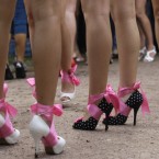 Participants in a high heel race wait for a start of a high heel race in Moscow, Russia, on 9 July, 2011. The