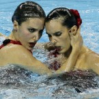 Spain's Andrea Fuentes and Ora Carbonell compete in the synchronised swimming Duets Free final, at the FINA 2011 Swimming World Championships in Shanghai, China, on 22 July, 2011. (AP Photo/Wong Maye-E)
