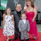Warwick Davis with wife Samantha and children Annabel and Harrison arriving for the world premiere of Harry Potter And The Deathly Hallows: Part 2 in London.