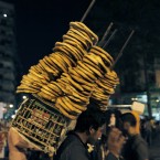 An Egyptian bread vendor among protesters at Tahrir Square in Cairo, Egypt (AP Photo/Nasser Nasser)
