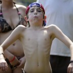 A competitor in the watermelon-seed spitting event at the Redneck Games in Atlanta, Georgia (AP Photo/Mike Stewart)