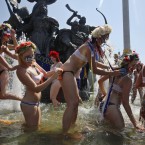 Ukrainian women's rights group Femen protest against a switch-off of the public hot water supply in central Kiev, Ukraine (AP Photo/Efrem Lukatsky)