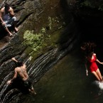 Cooling off at Wissahickon Valley Park, in Philadelphia. (AP Photo/Matt Rourke)
