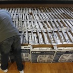 Fans for distribution to senior citizens. (AP Photo/Matt Rourke)