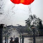 Children play in water pouring from an overhead release in Brooklyn, New York. (AP Photo/Bebeto Matthews)