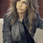 Celine Dion gargles the tune of one of her songs after she lost a bet during the German TV show 