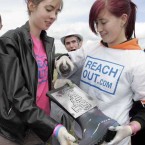 Carmel Sayers, left, gets her wellies pimped by Liz Murray at the ReachOut.com stall