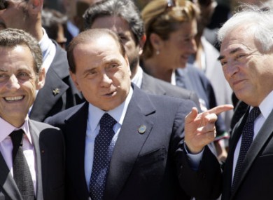 Three's a crowd: No strangers to sex controversies, French President Nicolas Sarkozy, Italian PM Silvio Berlusconi and former IMF MD Dominique Strauss-Kahn share a giggle in 2009.  