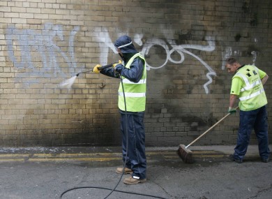 [File photo] Street cleaners remove graffiti in Dublin City Centre 
