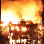 A store on fire near Reeves Corner, Croydon, south London on the third night of rioting (Lewis Whyld/PA Wire)