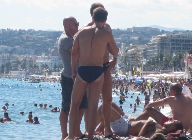 A man wearing Speedo-style brief swimwear. The Speedo company is suing an Australia blogger.