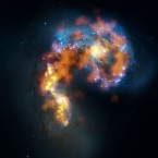 Another view of the Antennae Galaxies combining three different wavelength ranges captured by ALMA and visible light observations by Hubble. (Image: B Saxton, (NRAO/AUI/NSF), ALMA (ESO/NAOJ/NRAO). Visible light image: the NASA/ESA Hubble Space Telescope)