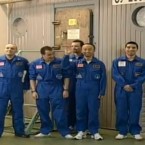 The six participants outside the isolated area in which they spent the last 520 days.
