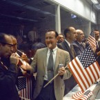NASA and Manned Spacecraft Centre officials join flight controllers in their post-mission celebrations. (NASA)