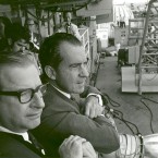 President Richard Nixon and NASA administrator Dr Thomas Paine wait for the astronauts to be flown from their landing pod to the USS Hornet. (NASA)