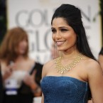 Frieda Pinto arrives for the 69th Annual Golden Globe Awards. (AP Photo/Chris Pizzello/PA Images)
