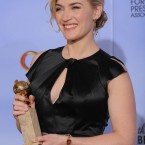 Kate Winslet with her award for Best Actress in a Mini Series or TV Movie for Mildred Pierce. (AP Photo/Mark J Terrill/PA Images)