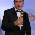 The Artist actor Jean Dujardin does his best 'Blue Steel' pose backstage with the award for Best Motion Picture - Comedy or Musical. (AP Photo/Mark J Terrill/PA Images)