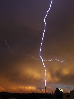 Lightning strikes the Hillbrow Telkom Tower in Johannesburg, South Africa, Friday, 11 December, 2009