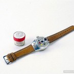 Sure where would any self-respecting spy be without the classic camera watch? (Image via photoshtab.ru)