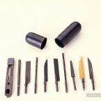 A set of tiny instruments which can all fit in the small capsule for, eh, 'bodily' concealment. (Image via photoshtab.ru)