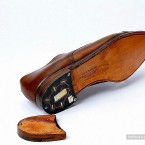 A smart pair of shoes with a handy recording device fitted inside the heel. (Image via photoshtab.ru)