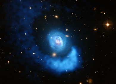 A galaxy cluster located about 480 million light years from Earth.