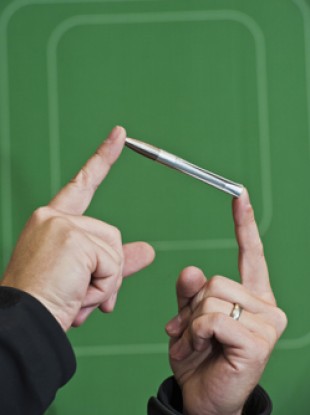 The four-inch-long bullet features small 'fins' that help guide it towards the target.