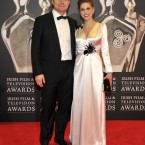 Actress/novellist Amy Huberman and her husband Irish rugby star Brian O'Driscoll in colour-coordinated outfits. (Photo by KOBPIX)