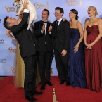Uggie and other cast members of The Artist during the 69th Annual Golden Globe Awards last month in Los Angeles. (AP Photo/Mark J. Terrill/PA Images)