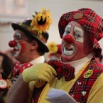 Clowns in the crowd. (Image: Yui Mok/PA Wire)